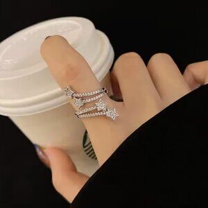 Silver tone star ring